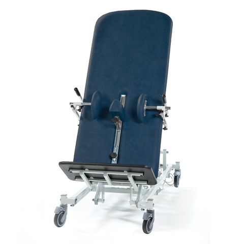Electric therapy tilt table with work table & divided leg to rent